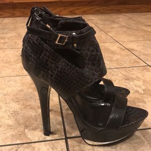 Black snake skin stilettos